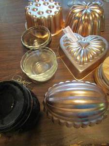 lot 493 image: 4 metal molds, jar with hinged lid 5 condiment cups and more