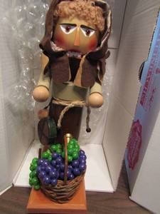 lot 497 image: Steinbach handmade Nutcracker made in Germany Steinbach Charming Wine Monk Nutcracker with wine & grapes marked