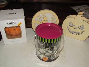 lot 514 image: NEW Sonoma pumpkin wax warmer, Halloween themed signs and cookie cutters