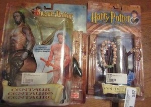 lot 557 image: Lord Valdemort and Centaur figurines in boxes
