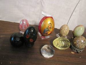 lot 581 image: Egg lot of 7- carved crystal, banded onyx, fossil stone and more