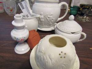 lot 594 image: White porcelain set- teapot with creamsugar covered candle holder and more