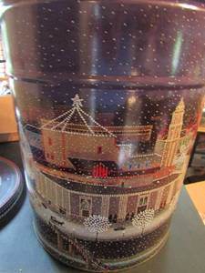 lot 599 image: 15x12 christmas tin with 20 rolls of ribbon
