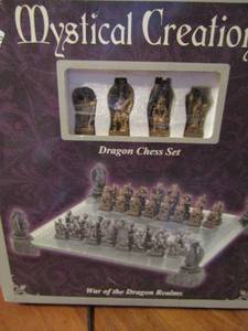 lot 616 image: Mystical creation War of the Dragons Realms dragon chess set in box