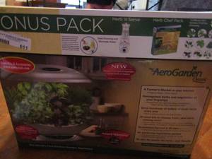 lot 611 image: Aero garden bonus pack. Grow plants quicker. Includes salad dressing maker,  14 assorted herbs NIB