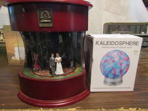 lot 627 image: Thomas Pacconi classics music box includes extra melody tracker in back plus kaleidoscope light up globe