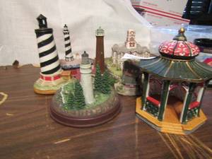 lot 655 image: Lefton, Lemax, and International source brand light houses 8 pieces