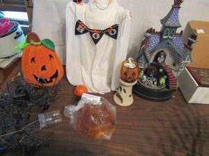 lot 696 image: Halloween lot- light up table top tree, velvet pumpkin, musical haunted house and much more