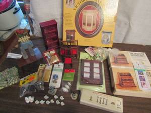 lot 709 image: Miniature lot-Victorian bag kit in box, 2 desk kits, dining table, chairs, mugs, and more