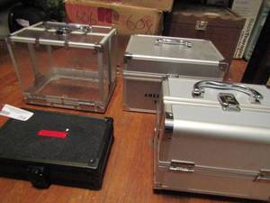 lot 714 image: American Girl carrying case plus 3 other hinged carry cases