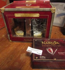 lot 715 image: Narnia box set of extended DVD and collectable bookends in box   Narina pewter sword and shield 16 scale replicas