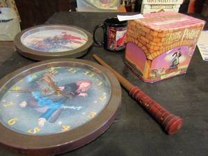 lot 733 image: Harry potter- Gringotts place, coffee mug, harry potter water ball, 2 wall clocks