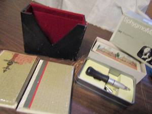 lot 794 image: American stereo scopic colored photos black box with pen and 2 card packs and more