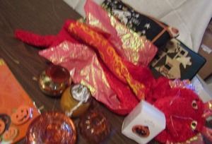 lot 797 image: Halloween toddler dragon costume,   pumpkin tea lights and themed pillows