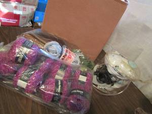 lot 801 image: Storage drawer full of misc.  Lots of Yarn pirouettes and more plus mini sewing machine