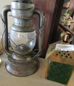 lot 811 image: 2 Dietz 0-light vintage oil lantern plus cherub candle holder