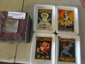 lot 818 image: 1 Snow White set of coasters and 1 pottery barn set of coasters