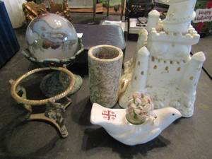 lot 842 image: Misc. lot-  ocean themed castle, fairy plaque in black box, oil lamp and more