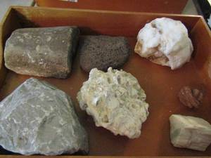 lot 856 image: Raw crystal lot 7 total including lava stone, petrified wood, calcite and more