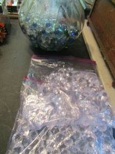lot 865 image: Large jar half full of marbles, 2 bags of plastic beads