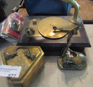 lot 877 image: Tandy brass music box, BMC distribution press, and trinket box