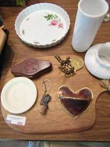 lot 885 image: Fiesta cup and saucer, cutting board, glass tart pan and more