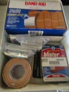 lot 887 image: Metal first aid kit with contents