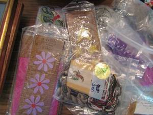 lot 903 image: generous amount of embroidery thread, kits, and magnets