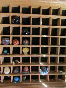 lot 974 image: Egg display rack 26x22x3 includes 16 stone eggs