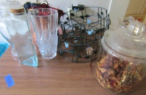 lot 981 image: Hanging baskets, potting pot, masks, 3 jars and 2 vases
