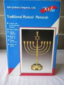lot 34 image: Traditional Musical Menorah In Box.