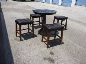 lot 68 image: 36-Round Patio Table, With 4-Leather Top Stools
