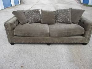 lot 79 image: Cindy Crawford Homes- Sofa With Throw Pillows