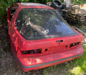 lot 32 image: RX7 BODY WITH 4 TIRES