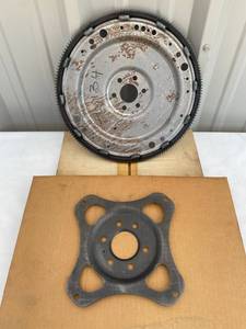 lot 54 image: CRANK SHAFT GEAR & NAPA FLEXPLATE