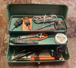 lot 77 image: TOOLBOX WITH3 SOLDERING IRONS, A NON CONTACT AC VOLTAGE DETECTOR WITH ADJUSTABLE SENSITVE AND MISC TOOLS
