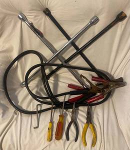lot 75 image: 2 4-WAY LUG WRENCHES, JUMPER CABLES, AND MISC ITEMS