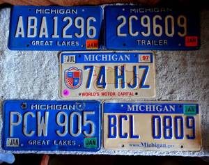 lot 60 image: COMING SOONASSORTMENT OF MICHIGAN LICENSE PLATES