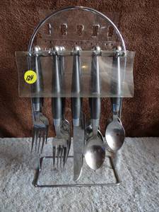 lot 124 image: NICE DINNERWEAR UTENSIL SET & STAND