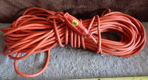 lot 130 image: LONG THREE PRONG EXTENSION CORD - 75-100 FT