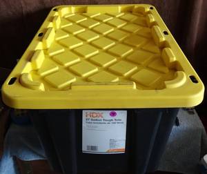 lot 138 image: HDX 27 Gal. Tough Storage Bin in Black wYellow Lid