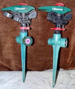 lot 198 image: PAIR OF GILMOUR SPRINKLER HEADS