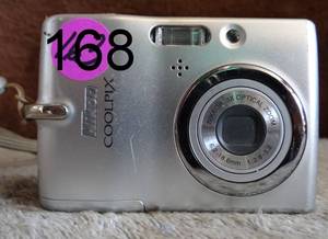 lot 168 image: COMING SOONVINTAGE NIKON COOLPIX CAMERA