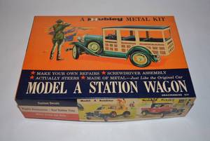 lot 41 image: Model Car Kit Model A Station Wagan Metal Car Kit in Original Box