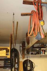 lot 432 image: 3-Prong Extension Cords,  Copper tubing and  metal hangers