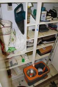 lot 216 image: Contents of Closet MopBucket, Irons, Hand Vac and Rags