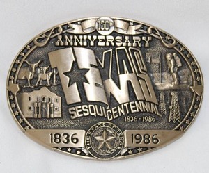 lot 512 image: Texas Sesquicentennial (1836-1986) anniversary belt buckle. 1986 H.T.S. and Associates. Solid Brass Made in USA