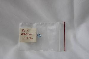 lot 518 image: Blue faceted 8 x 6mm gemstone. Note indicated Aquamarine but tests as Spinel. Please preview.