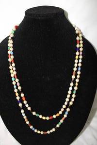 lot 520 image: Continuous opera length pearl and simulated gemstone bead necklace. 58L