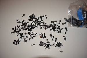 lot 131 image: Large Quantity of model train wheels axles